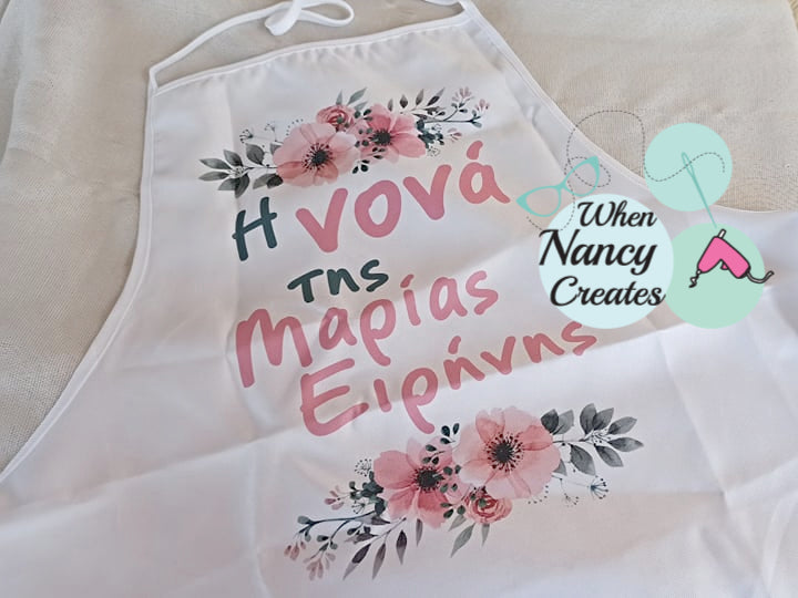 Ποδιά βάφτισης με θέμα λουλούδια