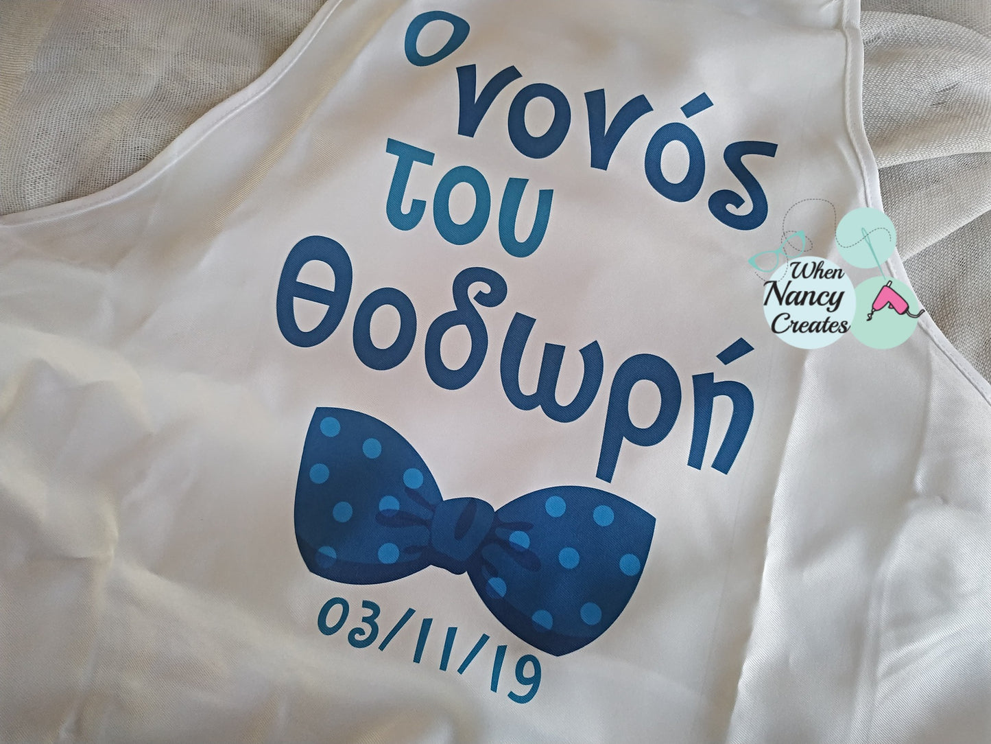 Ποδιά βάφτισης με θέμα φιόγκος