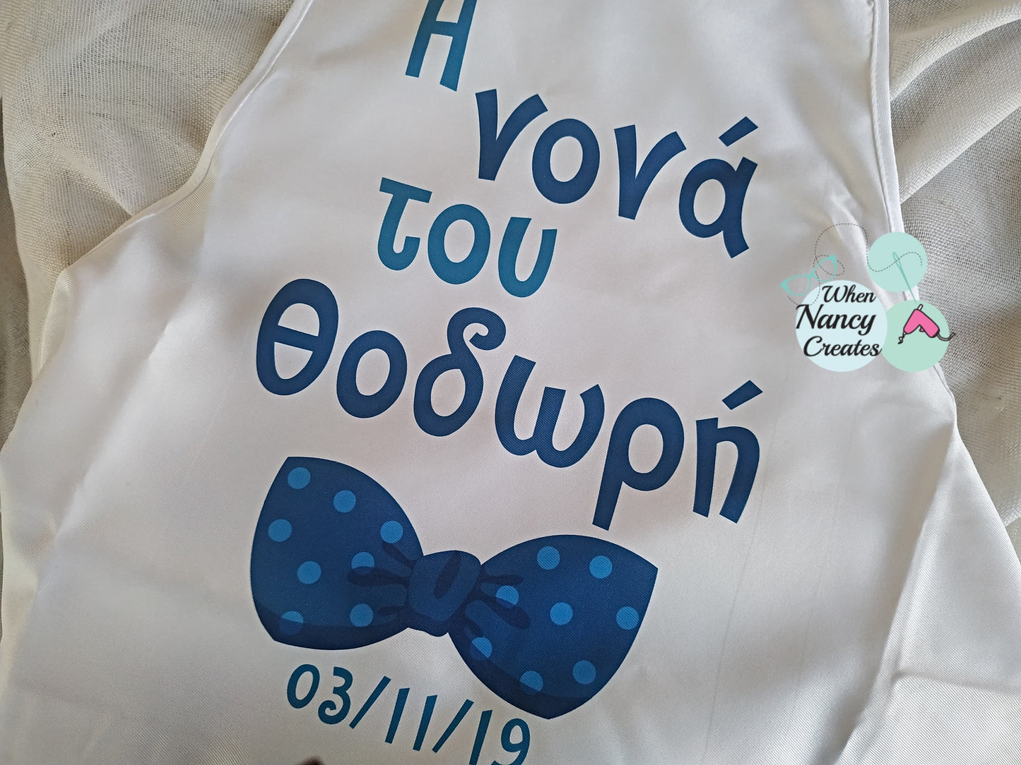 Ποδιά βάφτισης με θέμα φιόγκος